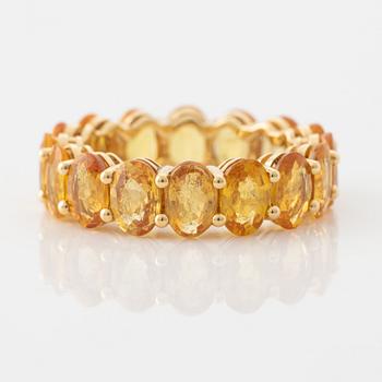 Oval yellow sapphire ring.