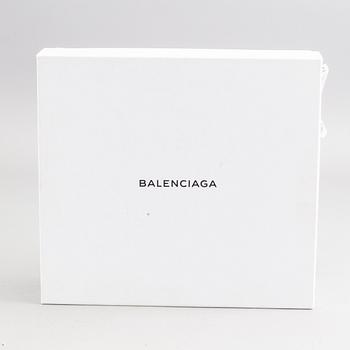 A pair of Balenciaga beige suede shoes size 38.