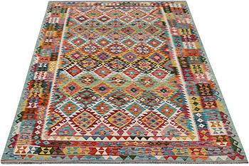 A carpet, Kilim, c. 295 x 195 cm.