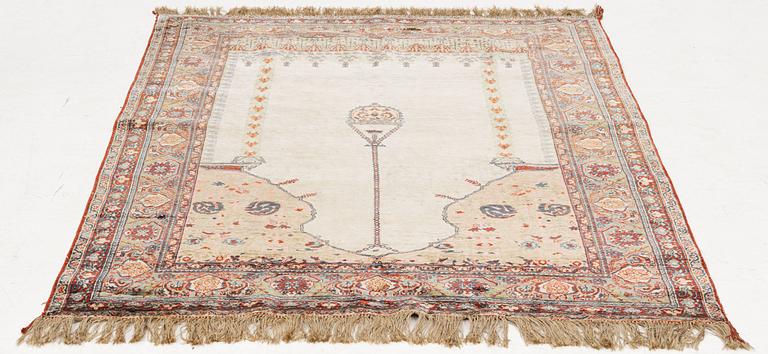 A semi-antique silk rug, probably Tabriz, c 164 x 110 cm,.