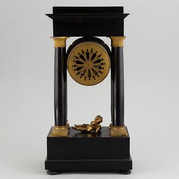 A late Empire´table clock.
