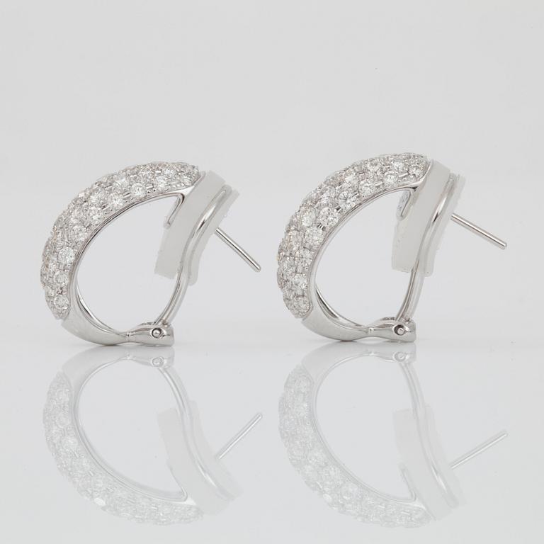 A pair of diamond earrings, 2.89 cts according to engraving.