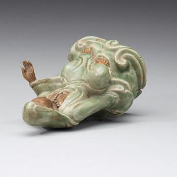 A seated celadon figure of Guanyin, presumably Longquan Ming dynasty, 17th Century.