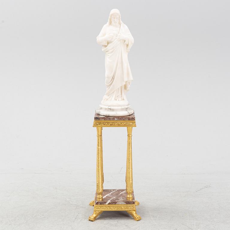 An alabaster sculpture with pedestal, 20th century.