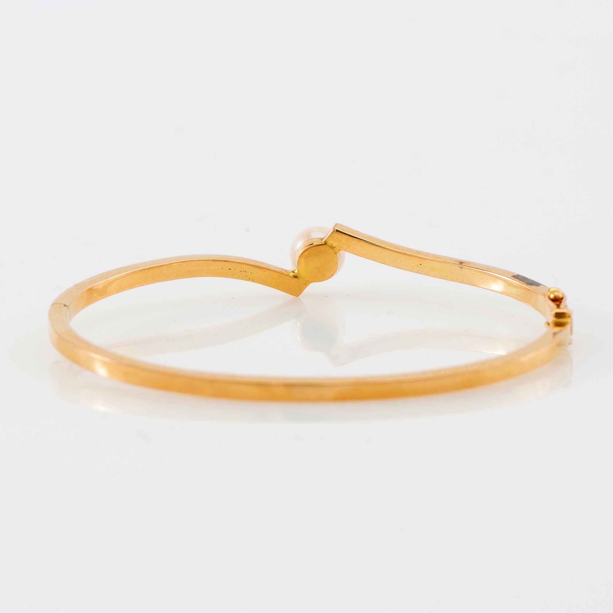 Armring, 18K guld och pärla, Stigbert, Stockholm, 1964.