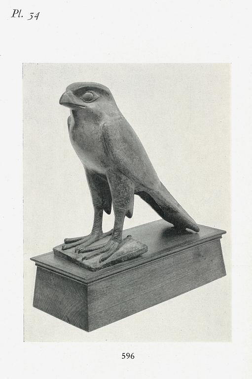 A fine and large Egyptian bronze figure of Horus the falcon, presumably late period Dynasty XXVI, (663-525 B.C.).