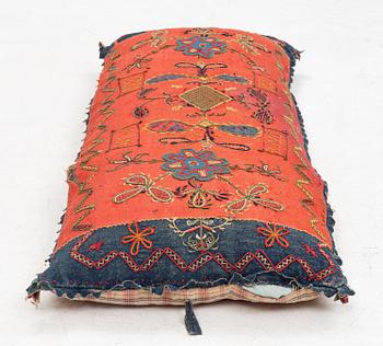 An embroidered carriage cushion, 100 x 50 cm, dated 1852.