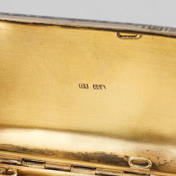 Two Russian 19th century silver and niello boxes and a silver purse, Moscow and St. Petersburg.