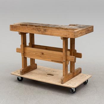 A mid 20th century pine carpenters bench.