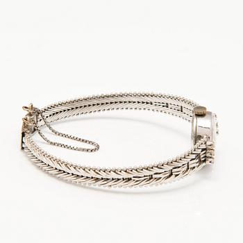 HILSON wrist watch, manual winding, 14K white gold, diamonds ca. 0.11 ct in total, 16 mm.