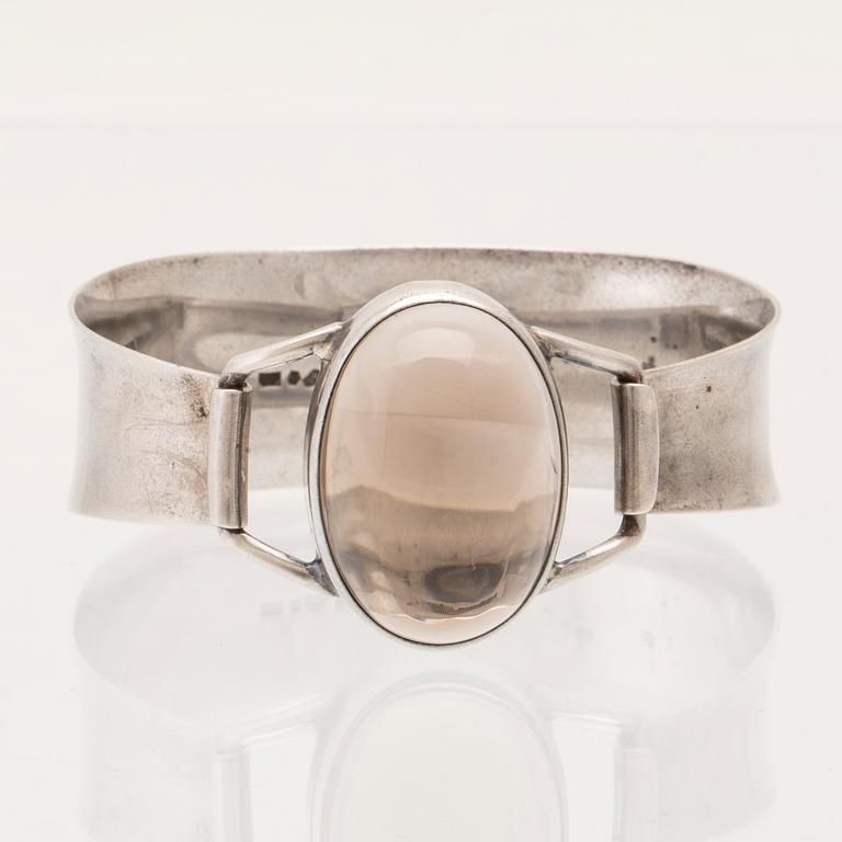 Silver bracelet with cabochon-cut smoky quartz, Gussi Malmö 1964.
