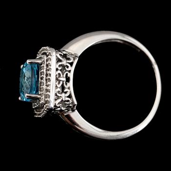 RING, 14K vitguld, diamanter tot ca 0.17 ct och topas. Total vikt ca 5 g.