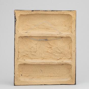 Åke Holm, a stoneware wall relief, signed.