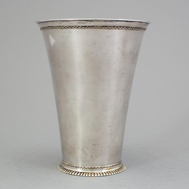 A SWEDISH SILVER BEAKER, mark of Johan Lund, Stockholm 1710. Weight c. 386 g.