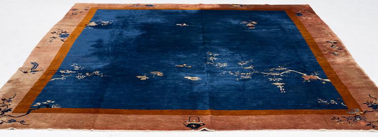 A Chinese art deco carpet, c. 327 x 278 cm.