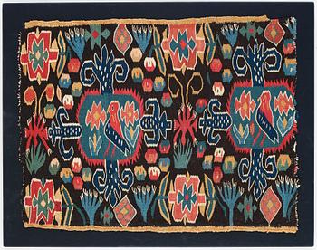 A CARRIAGE CUSHION FRAGMENT, tapestry weave, "Den innelykta fågeln", ca 52 x 67 cm, Scania (Sweden).