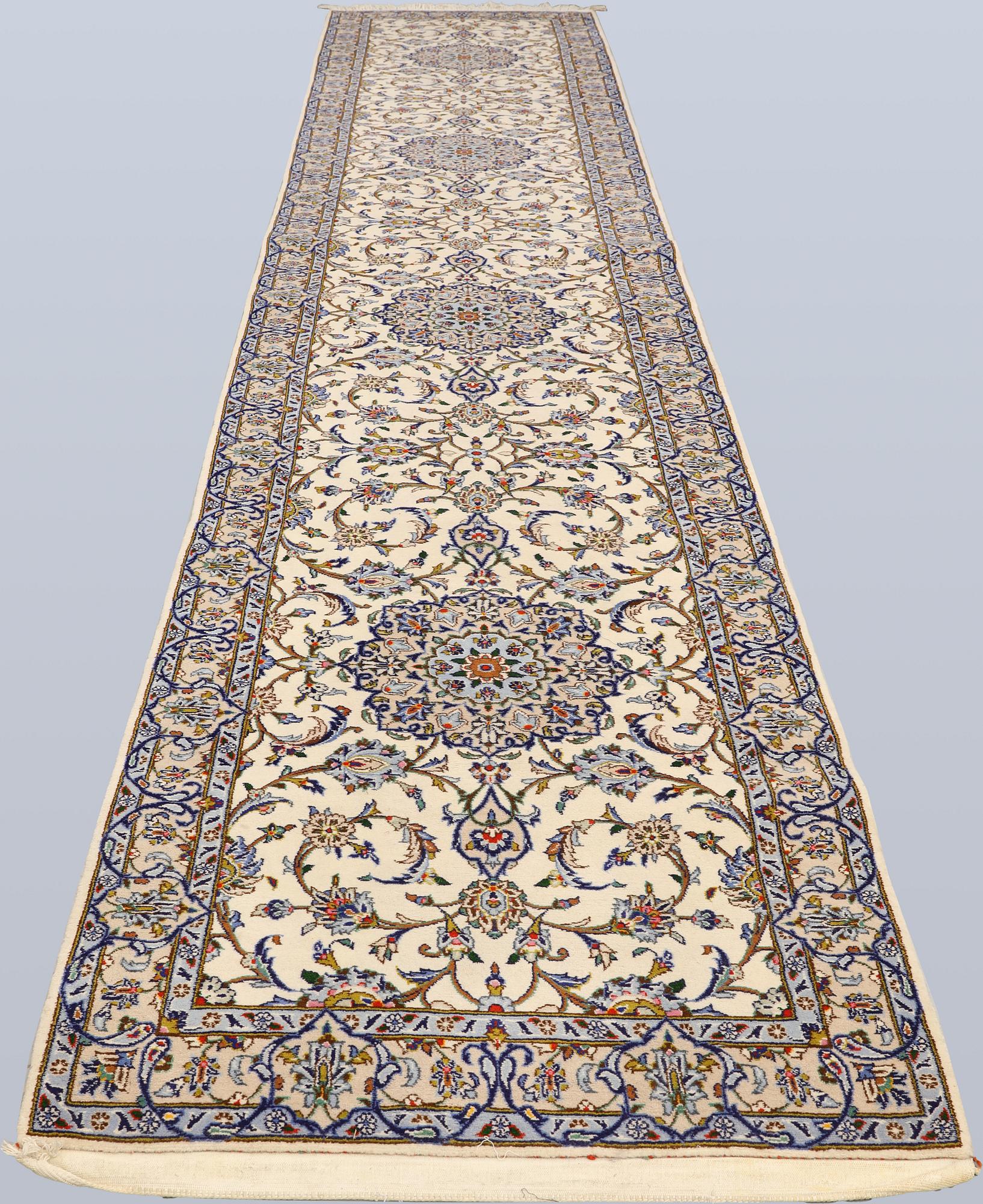 A Keshan runner, c. 586 x 103 cm.