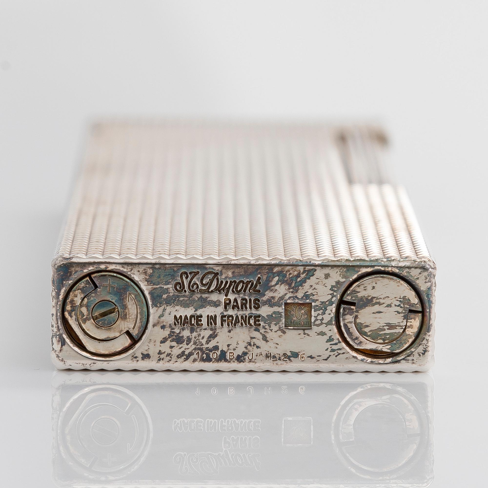 S.T. Dupont, a late 20th century table lighter.