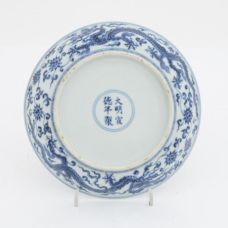 A Chinese blue and white porcelain 'dragon' dish, second half of the 20th century.