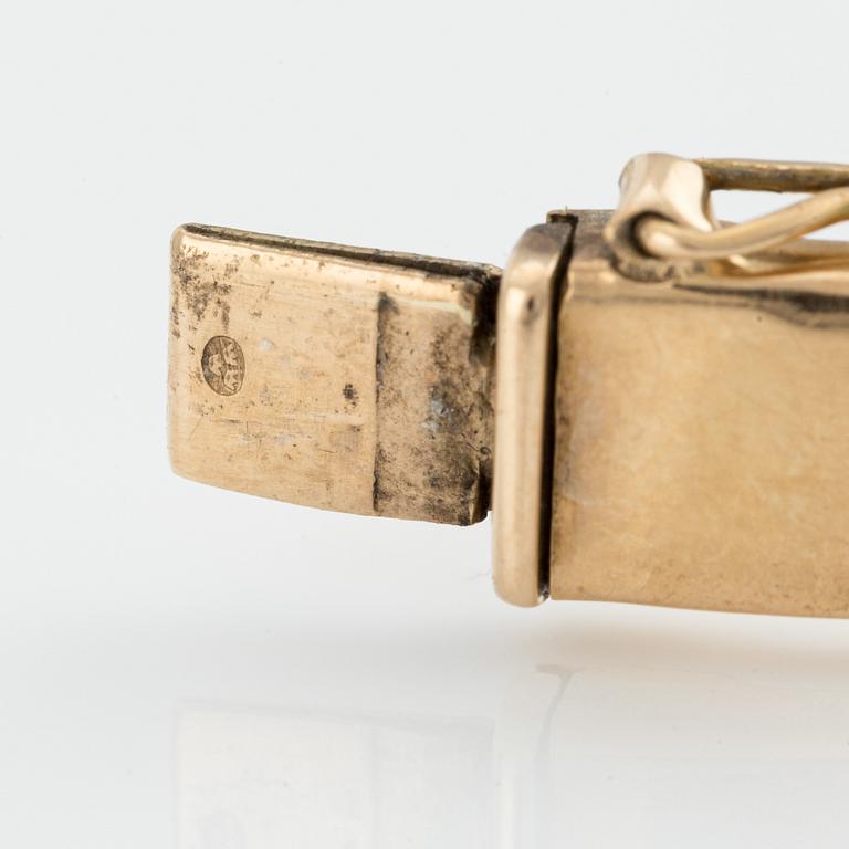 Bangle 18K gold.