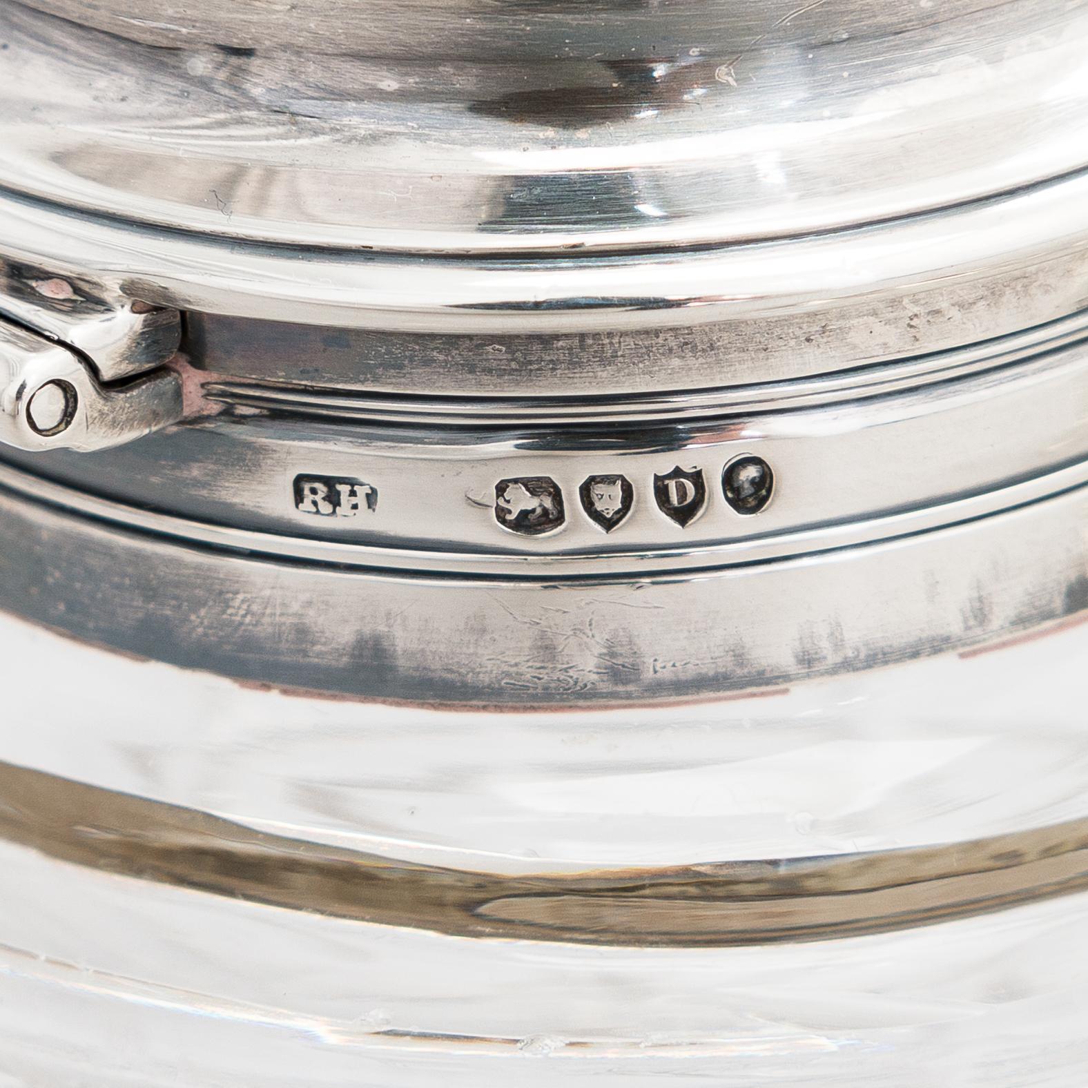 Glass and sterling silver cruet stand, maker's marks of Samuel Hennell and Robert Hennell III, London 1811 and 1879.