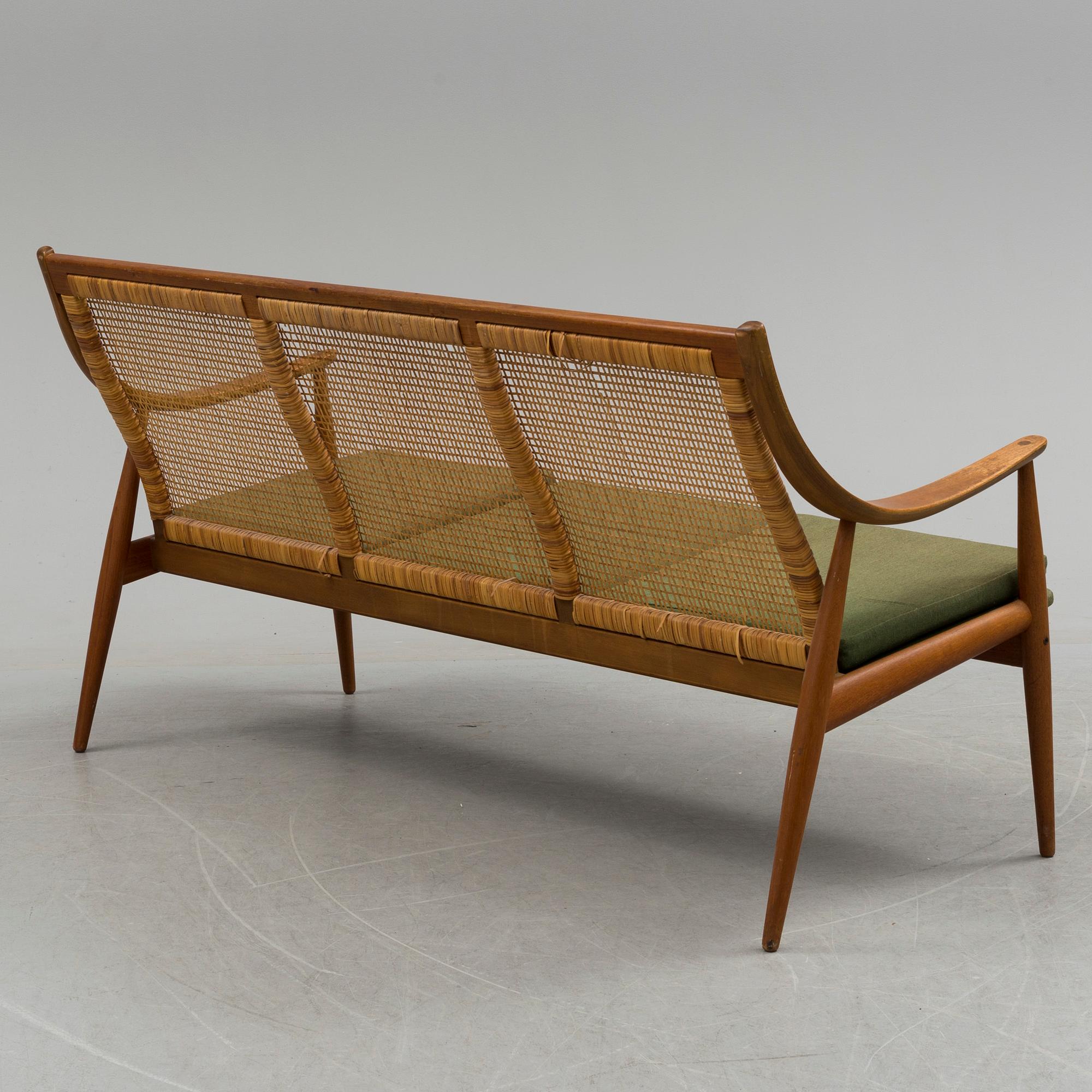 A Orla Mølgaard-Nielsen and Peter Hvidt sofa and armchair model FD 146 from France & Son, Denmark, 1950s.