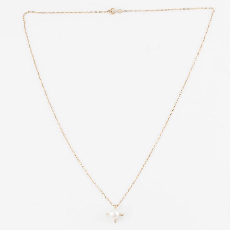 Collier, 14K vitguld med akvamarin och briljantslipade diamanter.