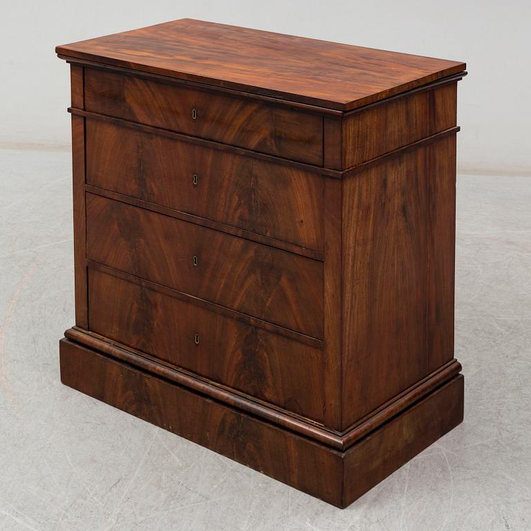 A northern european empire chest of drawers.