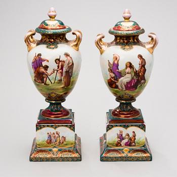 Two similar porcelain urns from around year 1900.