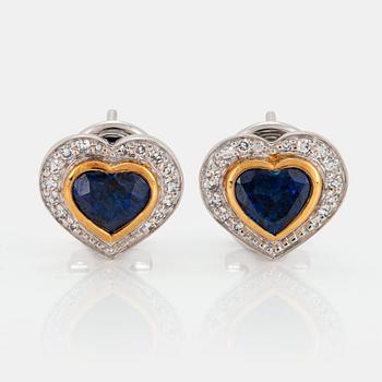 1113. A pair of 18K gold Meister earrings set with faceted heart formed sapphires and eight-cut diamonds.