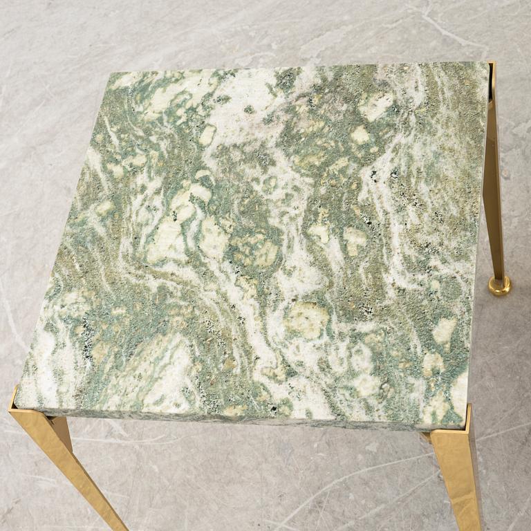 A pair of model 764 brass and marble side tables by Josef Frank for Firma Svenskt Tenn.