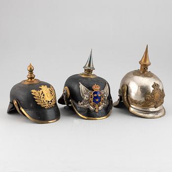 Three Swedish military helmets.