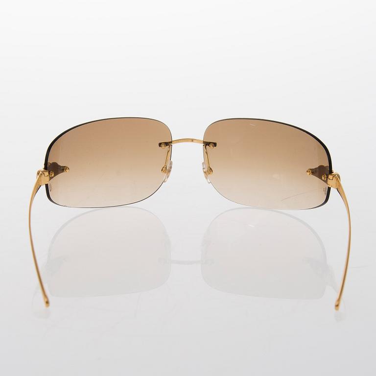 A pair of Panthère de Cartier Sunglasses.