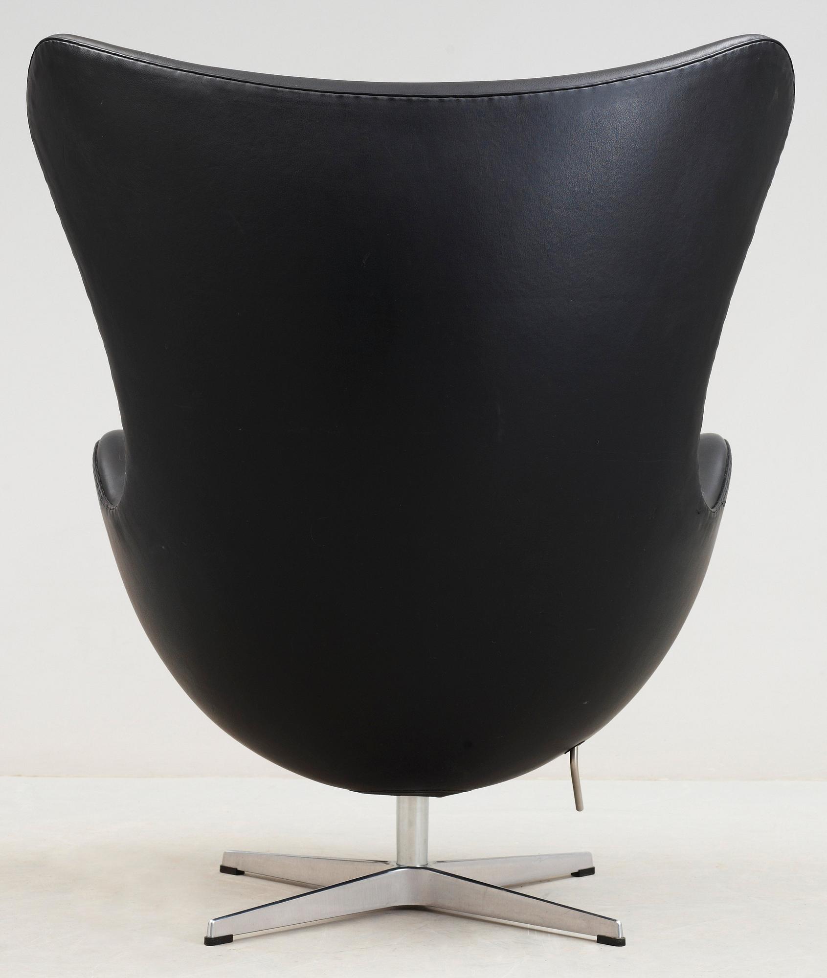 An Arne Jacobsen black leather 'Egg' chair, Fritz Hansen, Denmark 2007.