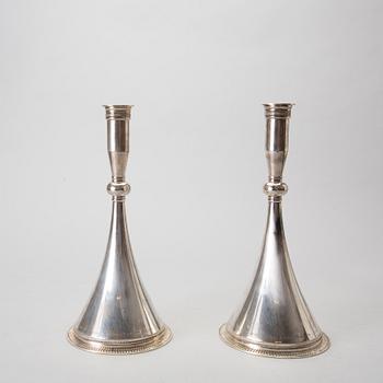 A pair of 20th century Swedish sterling silver candle sticks mark of W Nilsson Lund 1959, weight 768 gr.