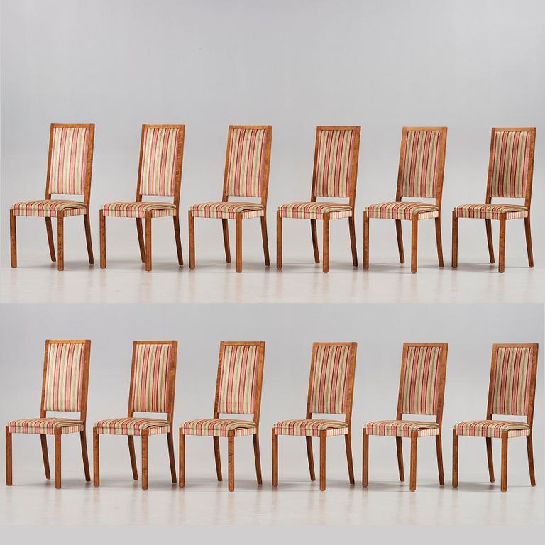 Wiwen Nilsson, a stained birch dining room set with a table and twelve chairs, Sweden 1930-40-tal.