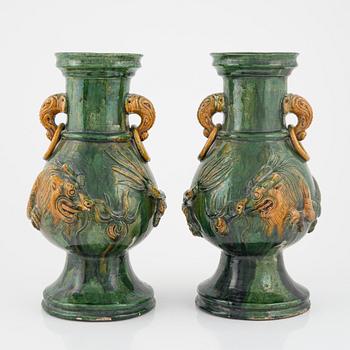 A pair of green and yellow glazed Ming style vases, Southern China.