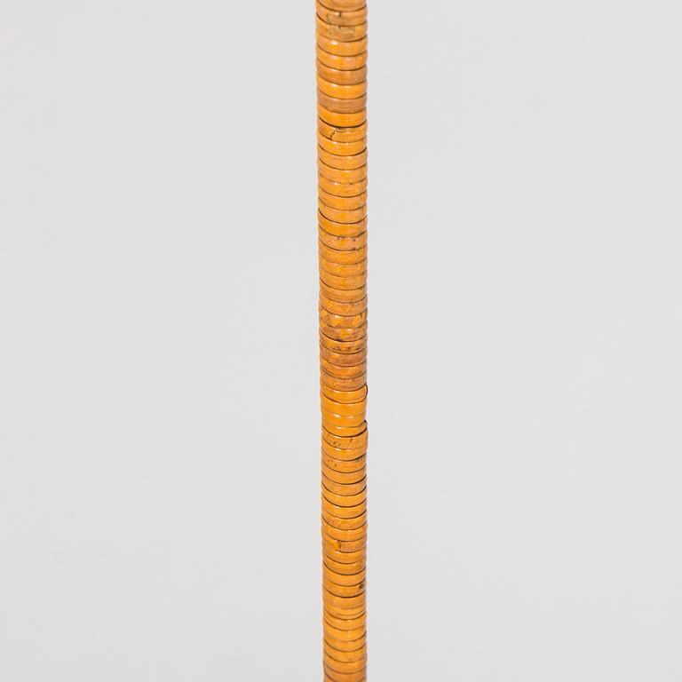 Paavo Tynell, a pair of mid-20th century K10-10 floor lamps for Taito Finland.