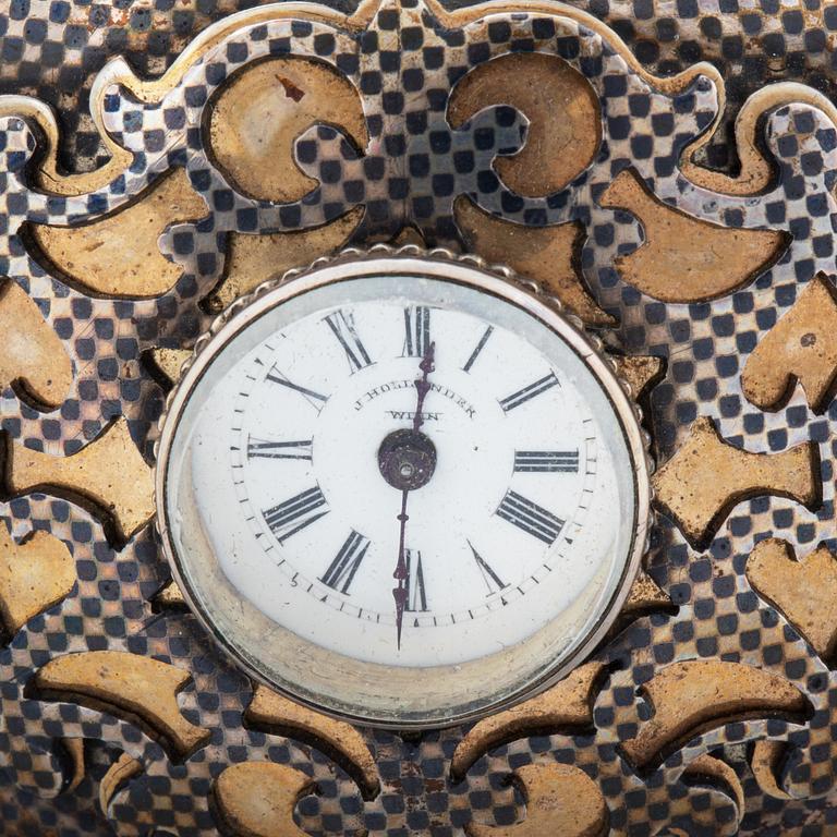 Silver bangle with watch.