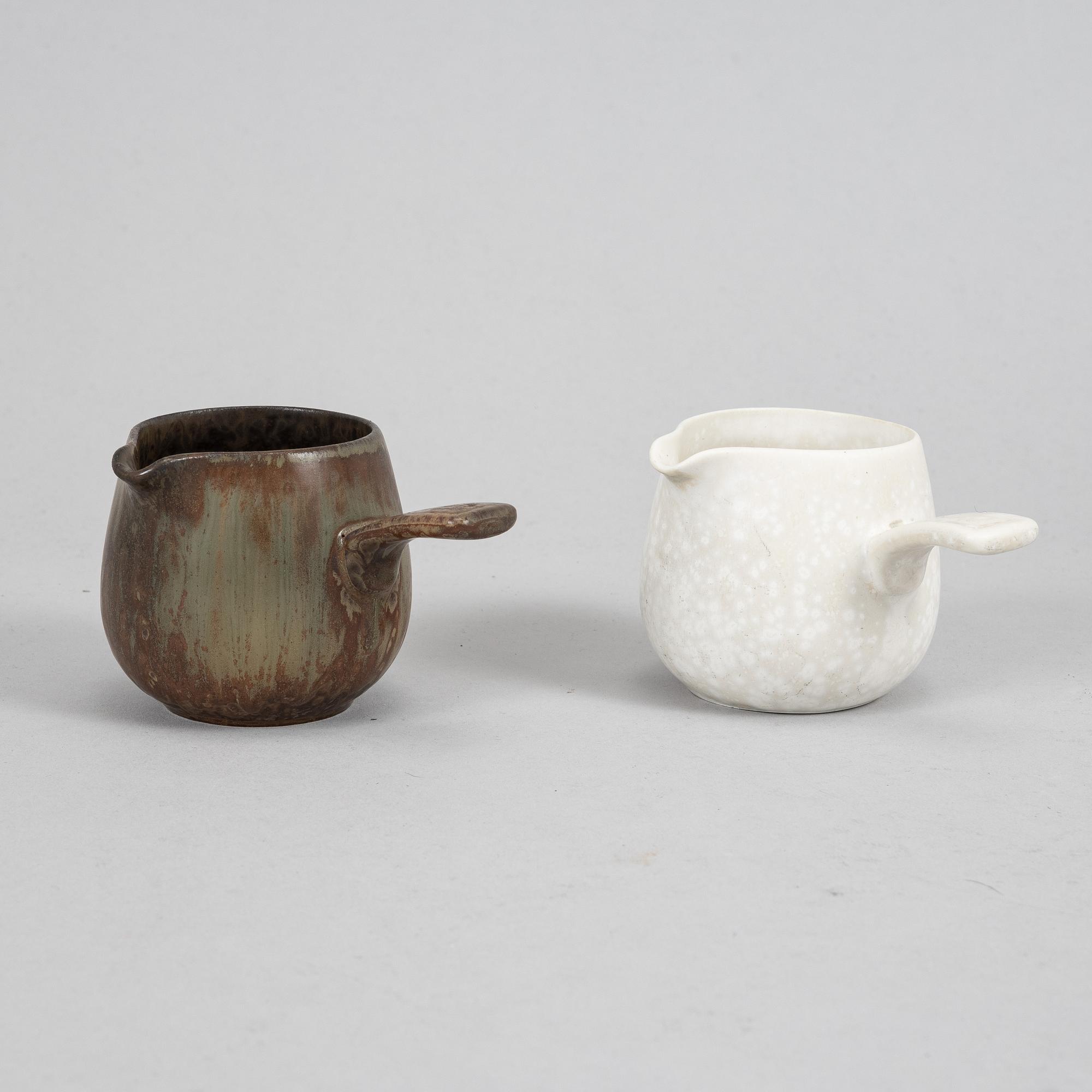 Tea pot, two bowls, two creamers, and a vase by Gunnar Nylund, stoneware, Rörstrand.