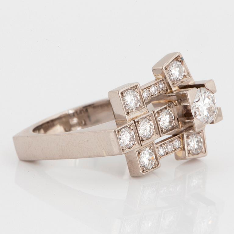 A Claës Giertta 18K white gold ring set with round brilliant- and eight-cut diamonds.