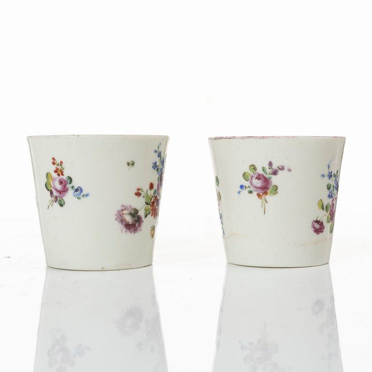 A pair of cups and saucers, France, 18th Century.