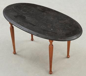 A Josef Frank black marble top table, Svenskt Tenn.