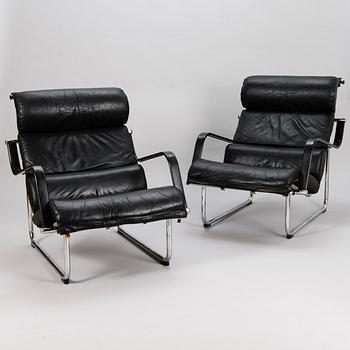 YRJÖ KUKKAPURO, A pair of late 1900s open armchairs, "Remmi" Avarte.