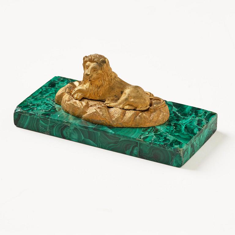 A Russian Nicholas II malachite-veneered and gilt-bronze paperweight, late 19th century.