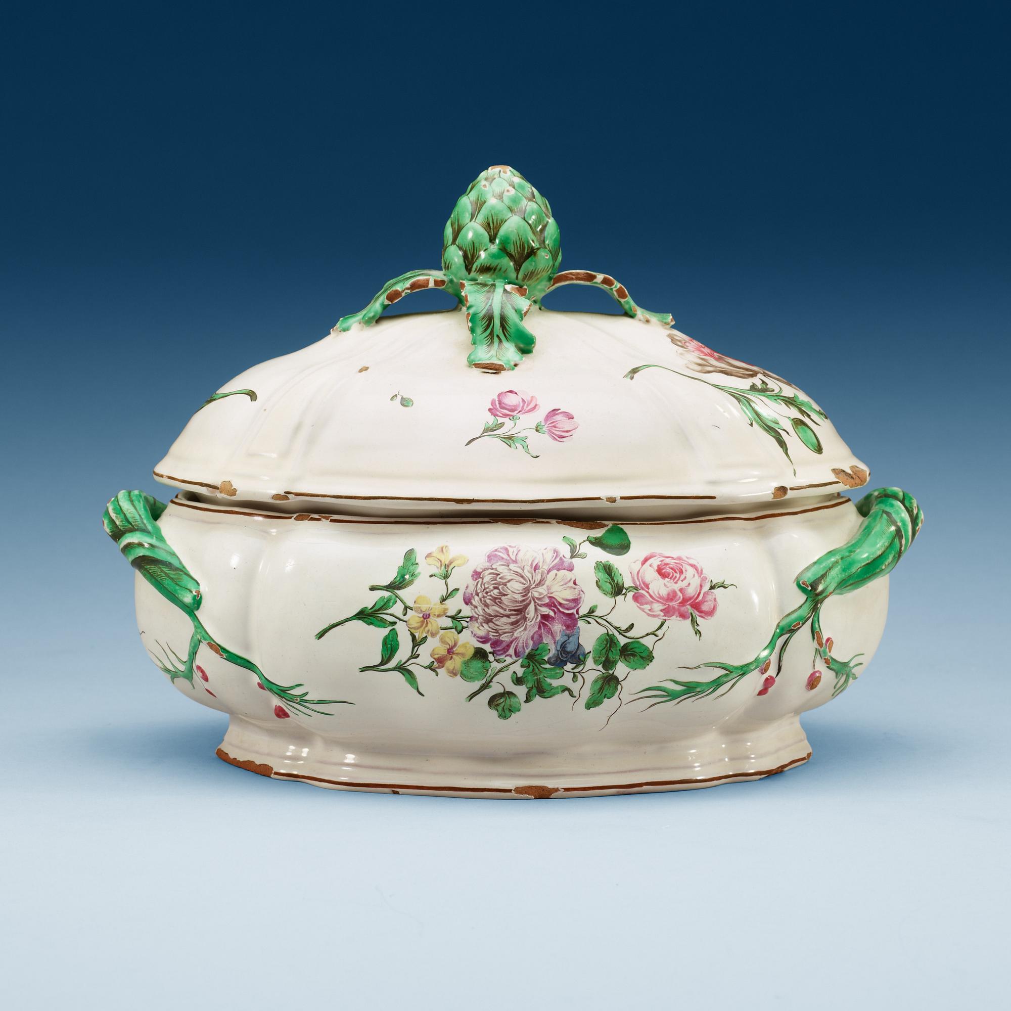 An unmarked faience tureen with cover, 18th Century.