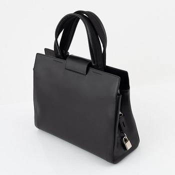 Prada, a black leather bag.