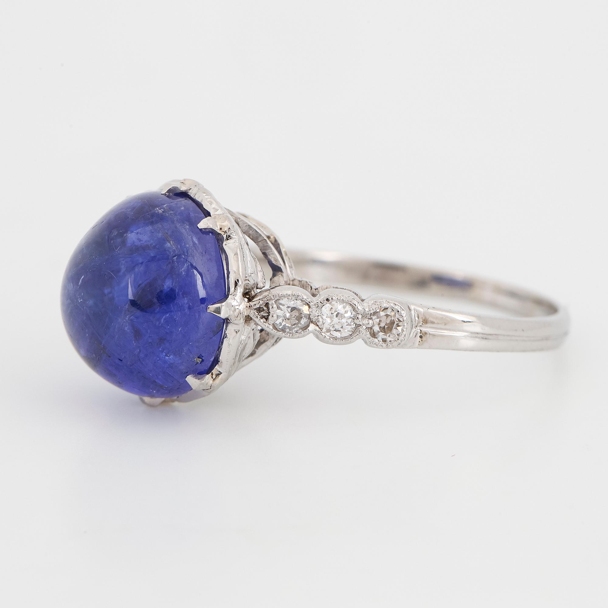 Cabochon-cut tanzanite and brilliant-cut diamond ring.