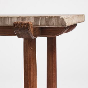 Axel Einar Hjorth, a stained pine and limestone top "Sandhamn" table, Nordiska Kompaniet, Sweden 1931.