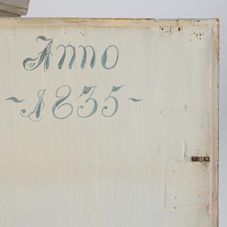 A 19th century cabinet.